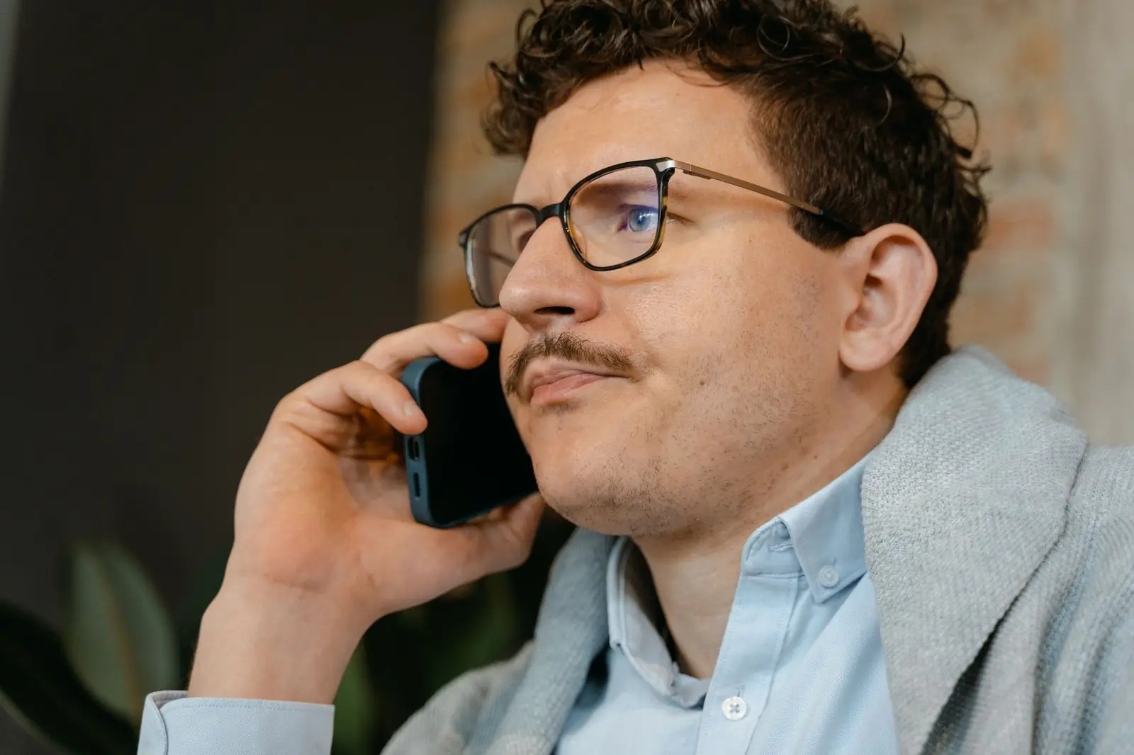 Man listening on a phone call