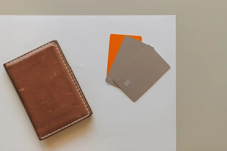 Leather wallet and cards on a desk, the ID a visitor brings